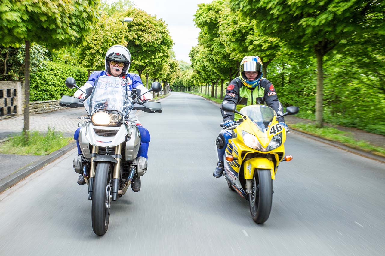 two people on motorcycles frontview